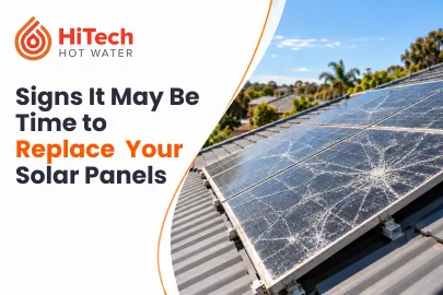Featured image showing damaged rooftop solar panels that may require replacement.